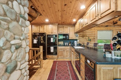 Exquisite Lakefront Log Cabin in Hideaway Hills - A Rare Find on on Hide-A-Way Hills Golf Club in Ohio - for sale on GolfHomes.com, golf home, golf lot