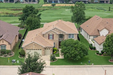 Experience the majestic two-story brick Ladera model, situated on Wildhorse Golf Club of Robson Ranch in Texas - for sale on GolfHomes.com, golf home, golf lot