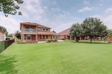 Experience the majestic two-story brick Ladera model, situated on Wildhorse Golf Club of Robson Ranch in Texas - for sale on GolfHomes.com, golf home, golf lot