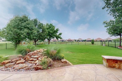 Experience the majestic two-story brick Ladera model, situated on Wildhorse Golf Club of Robson Ranch in Texas - for sale on GolfHomes.com, golf home, golf lot