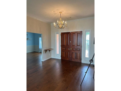 House of your dreams! This stately one story brick home with on Red Eagle Golf Course in Alabama - for sale on GolfHomes.com, golf home, golf lot