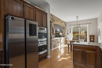 Located in a gated Somersett community, this beautifully on Somersett Country Club in Nevada - for sale on GolfHomes.com, golf home, golf lot