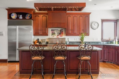 Arriving at this stunning 9,523SF luxury custom-built home on Ptarmigan Golf Course in Colorado - for sale on GolfHomes.com, golf home, golf lot