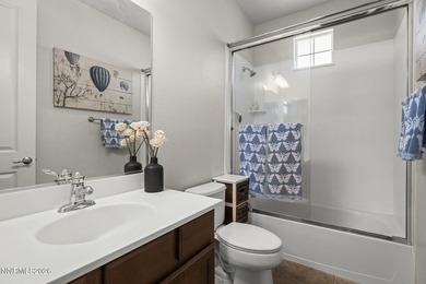 Located in a gated Somersett community, this beautifully on Somersett Country Club in Nevada - for sale on GolfHomes.com, golf home, golf lot