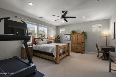 Located in a gated Somersett community, this beautifully on Somersett Country Club in Nevada - for sale on GolfHomes.com, golf home, golf lot