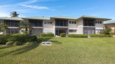 This waterfront, first-floor condo in the Angelfish Cay on Card Sound Golf Club in Florida - for sale on GolfHomes.com, golf home, golf lot