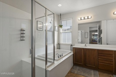 Located in a gated Somersett community, this beautifully on Somersett Country Club in Nevada - for sale on GolfHomes.com, golf home, golf lot