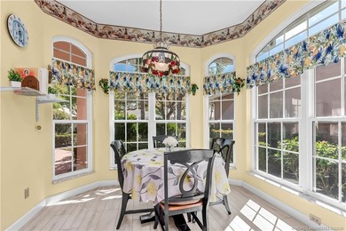 Enjoy breathtaking lake and golf course views from this on Monarch Country Club in Florida - for sale on GolfHomes.com, golf home, golf lot