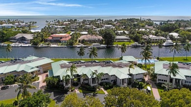 This waterfront, first-floor condo in the Angelfish Cay on Card Sound Golf Club in Florida - for sale on GolfHomes.com, golf home, golf lot