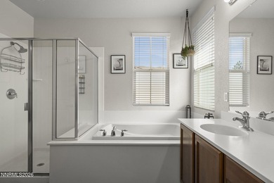 Located in a gated Somersett community, this beautifully on Somersett Country Club in Nevada - for sale on GolfHomes.com, golf home, golf lot