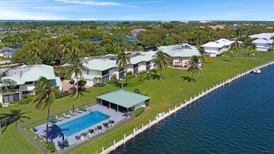 This waterfront, first-floor condo in the Angelfish Cay on Card Sound Golf Club in Florida - for sale on GolfHomes.com, golf home, golf lot