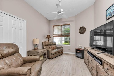 Enjoy breathtaking lake and golf course views from this on Monarch Country Club in Florida - for sale on GolfHomes.com, golf home, golf lot