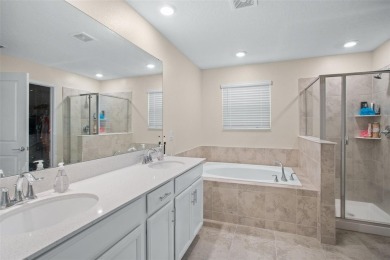 **This property qualifies for a closing cost credit up to $3,200 on ChampionsGate Golf Resort in Florida - for sale on GolfHomes.com, golf home, golf lot