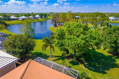 Enjoy breathtaking lake and golf course views from this on Monarch Country Club in Florida - for sale on GolfHomes.com, golf home, golf lot