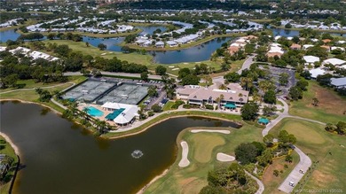 Enjoy breathtaking lake and golf course views from this on Monarch Country Club in Florida - for sale on GolfHomes.com, golf home, golf lot