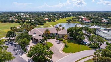 Enjoy breathtaking lake and golf course views from this on Monarch Country Club in Florida - for sale on GolfHomes.com, golf home, golf lot