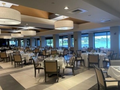 Experience luxury living in this exquisite 3,105 sq ft residence on Stonebridge Golf and Country Club in Florida - for sale on GolfHomes.com, golf home, golf lot