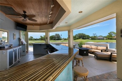 Enjoy breathtaking lake and golf course views from this on Monarch Country Club in Florida - for sale on GolfHomes.com, golf home, golf lot