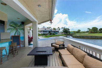 Enjoy breathtaking lake and golf course views from this on Monarch Country Club in Florida - for sale on GolfHomes.com, golf home, golf lot