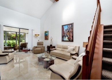 End unit villa in Boca Pointe's La Mirada with soaring ceilings on Boca Pointe Country Club in Florida - for sale on GolfHomes.com, golf home, golf lot