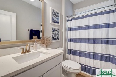 Welcome to this exquisite former model home, a stunning showcase on Savannah Quarters Country Club in Georgia - for sale on GolfHomes.com, golf home, golf lot