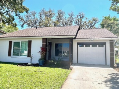 Looking for that perfect, quaint, cottage-sized home, in a on Summertree Golf Course in Florida - for sale on GolfHomes.com, golf home, golf lot