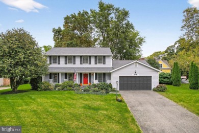 Discover your forever home in Bay Hills! This charming 4-bedroom on Bay Hills Golf Club in Maryland - for sale on GolfHomes.com, golf home, golf lot