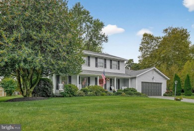 Discover your forever home in Bay Hills! This charming 4-bedroom on Bay Hills Golf Club in Maryland - for sale on GolfHomes.com, golf home, golf lot