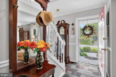 Discover your forever home in Bay Hills! This charming 4-bedroom on Bay Hills Golf Club in Maryland - for sale on GolfHomes.com, golf home, golf lot