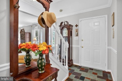 Discover your forever home in Bay Hills! This charming 4-bedroom on Bay Hills Golf Club in Maryland - for sale on GolfHomes.com, golf home, golf lot