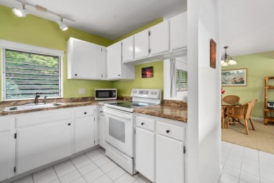 Island life awaits you in this bright and airy top floor condo on Kona Country Club Golf Course in Hawaii - for sale on GolfHomes.com, golf home, golf lot
