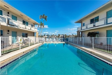 Discover the epitome of Naples waterfront living at Yacht Harbor on The Moorings Country Club in Florida - for sale on GolfHomes.com, golf home, golf lot