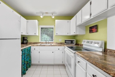 Island life awaits you in this bright and airy top floor condo on Kona Country Club Golf Course in Hawaii - for sale on GolfHomes.com, golf home, golf lot