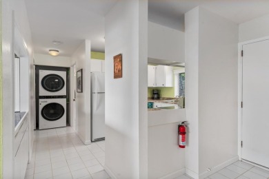 Island life awaits you in this bright and airy top floor condo on Kona Country Club Golf Course in Hawaii - for sale on GolfHomes.com, golf home, golf lot