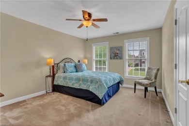 Welcome to your dream home, an all-brick w/ side load three car on Riverfront Golf Club in Virginia - for sale on GolfHomes.com, golf home, golf lot