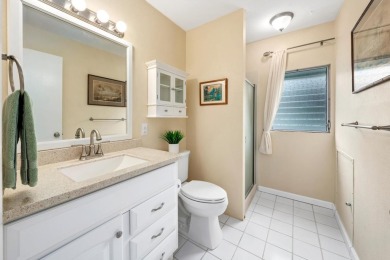 Island life awaits you in this bright and airy top floor condo on Kona Country Club Golf Course in Hawaii - for sale on GolfHomes.com, golf home, golf lot