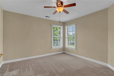 Welcome to your dream home, an all-brick w/ side load three car on Riverfront Golf Club in Virginia - for sale on GolfHomes.com, golf home, golf lot