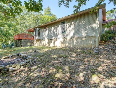 Discover this charming home in an active, quiet community.  As on Diamondhead Golf and Country Club in Arkansas - for sale on GolfHomes.com, golf home, golf lot