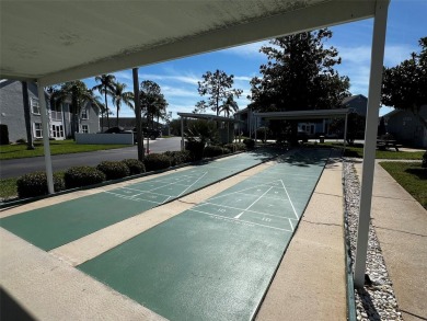 Lovely FURNISHED end unit in the well maintained community of on Beacon Woods Golf Club in Florida - for sale on GolfHomes.com, golf home, golf lot