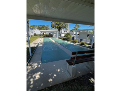 Lovely FURNISHED end unit in the well maintained community of on Beacon Woods Golf Club in Florida - for sale on GolfHomes.com, golf home, golf lot