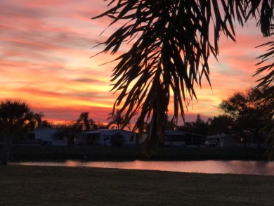 Stunning Sunsets await you!  Turn-key home in vibrant 55+ on Spanish Lakes Fairways in Florida - for sale on GolfHomes.com, golf home, golf lot