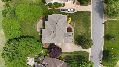 Welcome to your dream home, an all-brick w/ side load three car on Riverfront Golf Club in Virginia - for sale on GolfHomes.com, golf home, golf lot