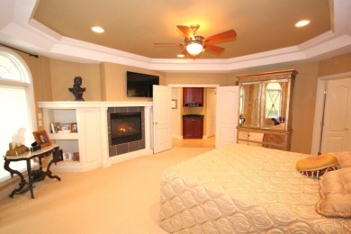 This stunning ranch is a dream home in the exclusive TPC golf on TPC Rivers Bend in Ohio - for sale on GolfHomes.com, golf home, golf lot