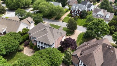 Welcome to your dream home, an all-brick w/ side load three car on Riverfront Golf Club in Virginia - for sale on GolfHomes.com, golf home, golf lot