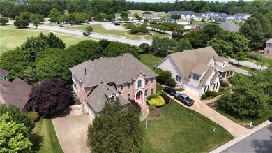 Welcome to your dream home, an all-brick w/ side load three car on Riverfront Golf Club in Virginia - for sale on GolfHomes.com, golf home, golf lot