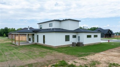 Modern Style on Summerville!  Welcome to 201 Summerville Drive on Vache-Grasse Country Club in Arkansas - for sale on GolfHomes.com, golf home, golf lot