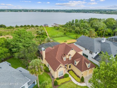 Absolutely gorgeous, two-story pool home with pristine Lake on Country Club of Mount Dora in Florida - for sale on GolfHomes.com, golf home, golf lot