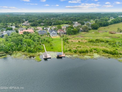 Absolutely gorgeous, two-story pool home with pristine Lake on Country Club of Mount Dora in Florida - for sale on GolfHomes.com, golf home, golf lot