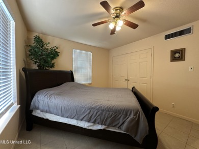 Affordable two bedroom flat located on the southwest side and on Pascagoula Country Club in Mississippi - for sale on GolfHomes.com, golf home, golf lot
