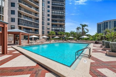 This twelth-floor residence provides the perfect elevation for on Club at Pelican Bay Golf Course in Florida - for sale on GolfHomes.com, golf home, golf lot